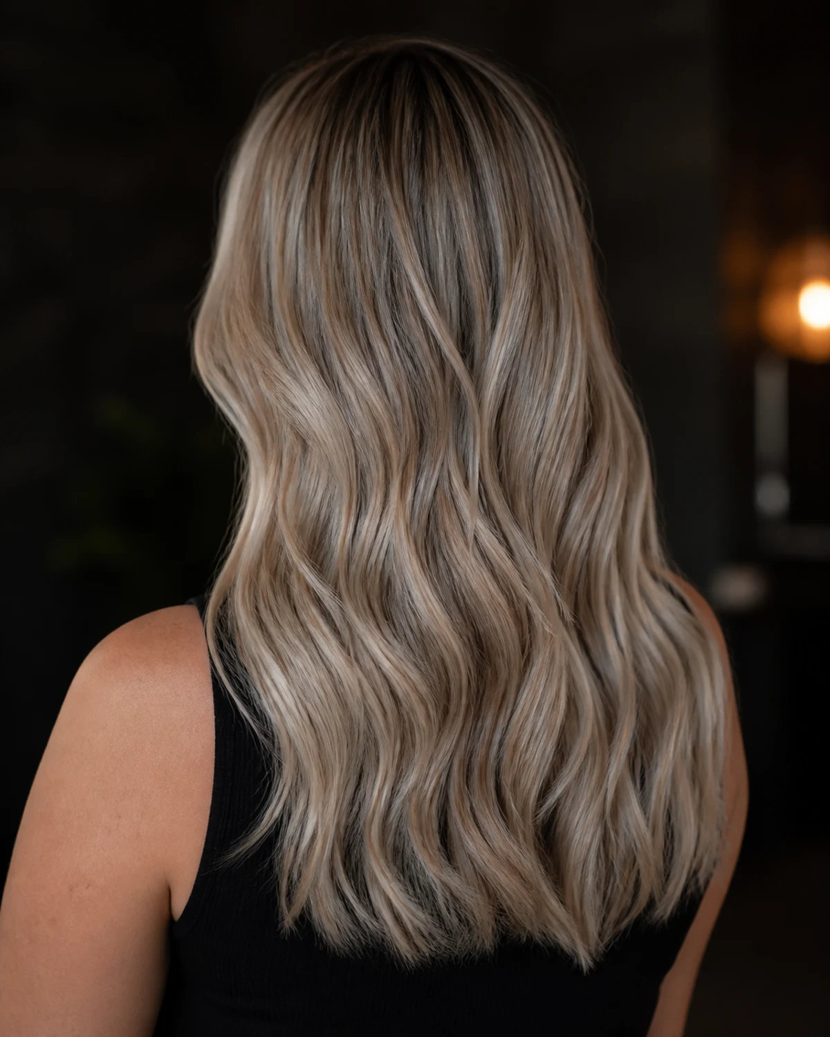 Ash blonde waves viewed from the back